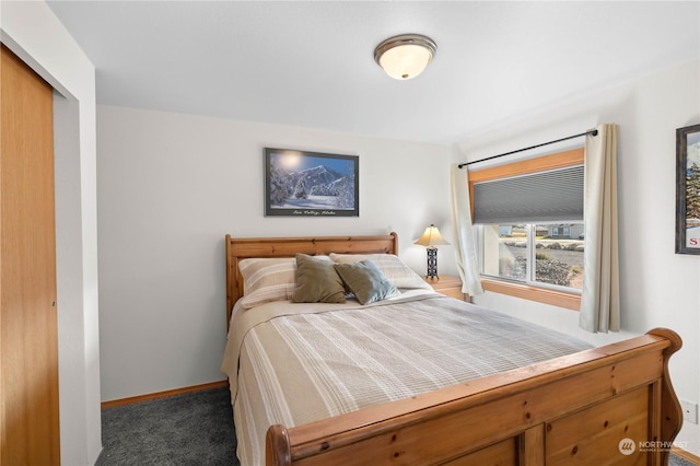 carpeted bedroom with a closet