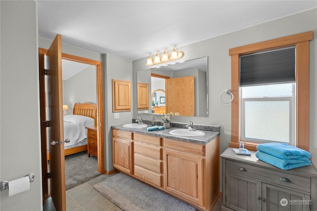 bathroom featuring vanity and tile patterned flooring