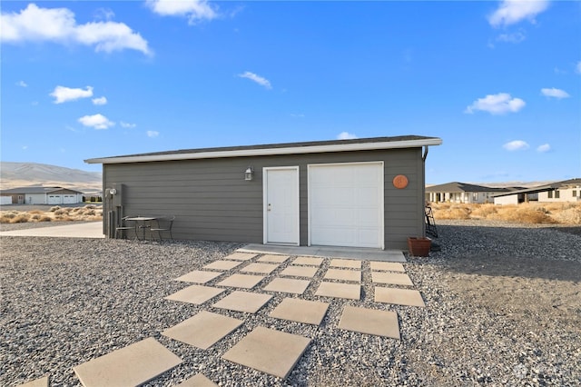 garage featuring a mountain view