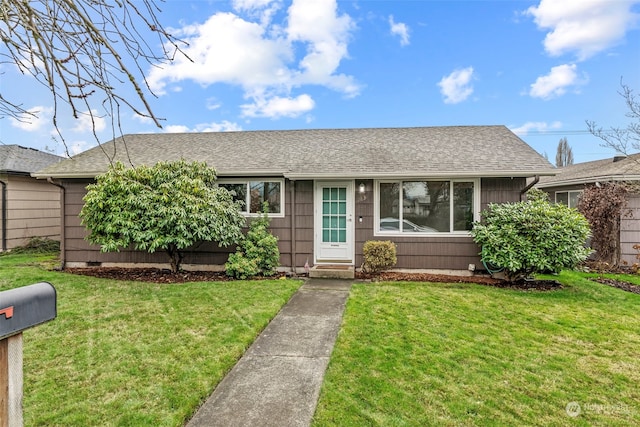 single story home with a front yard