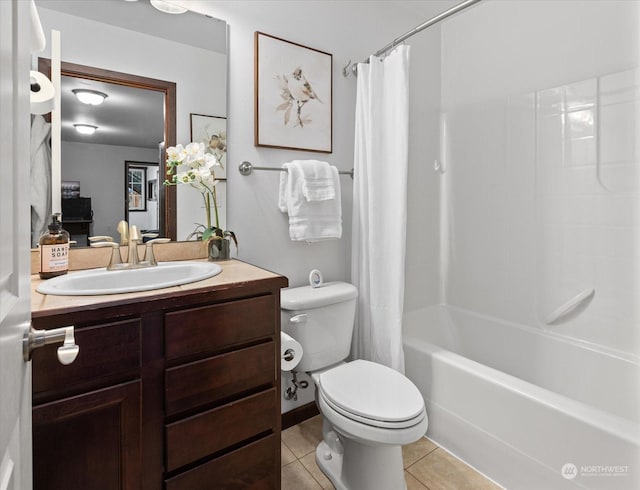 full bathroom with tile patterned flooring, shower / bath combo, toilet, and vanity