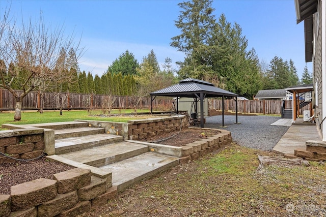 view of yard featuring a gazebo and a patio