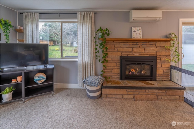 carpeted living room with a fireplace and an AC wall unit