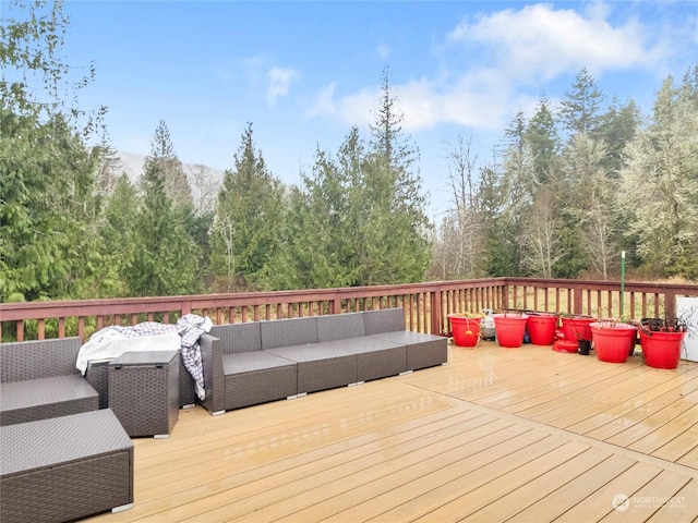 deck featuring an outdoor living space