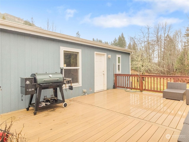 wooden deck with area for grilling