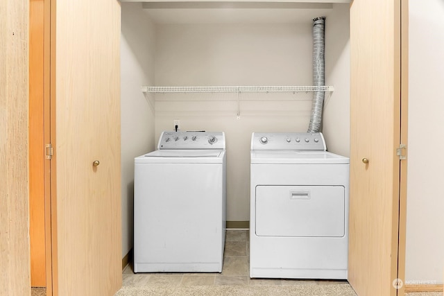 washroom featuring separate washer and dryer