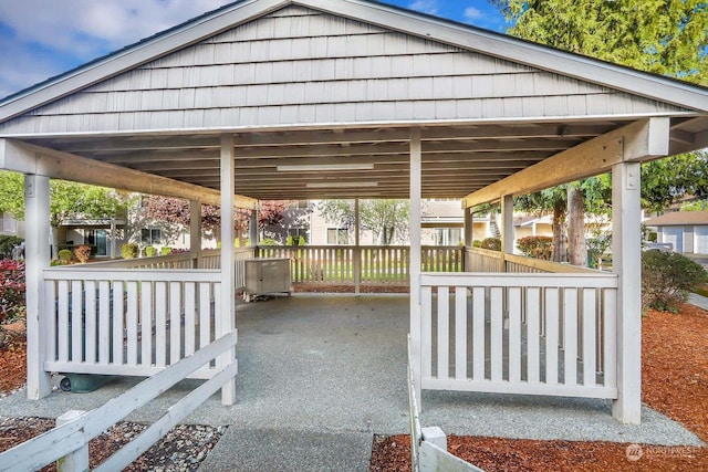 view of patio / terrace with a carport