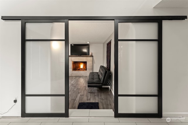 kitchen featuring a tiled fireplace