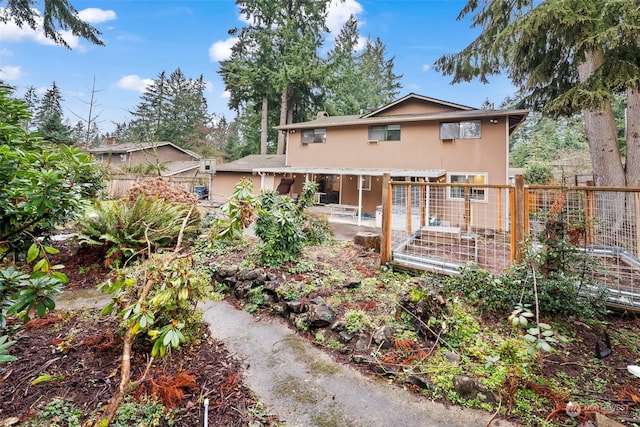 rear view of house with a patio area