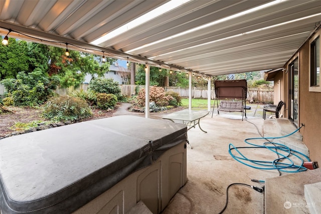 view of patio / terrace featuring a hot tub