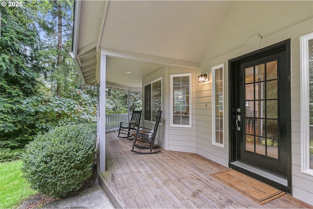 wooden deck featuring a porch