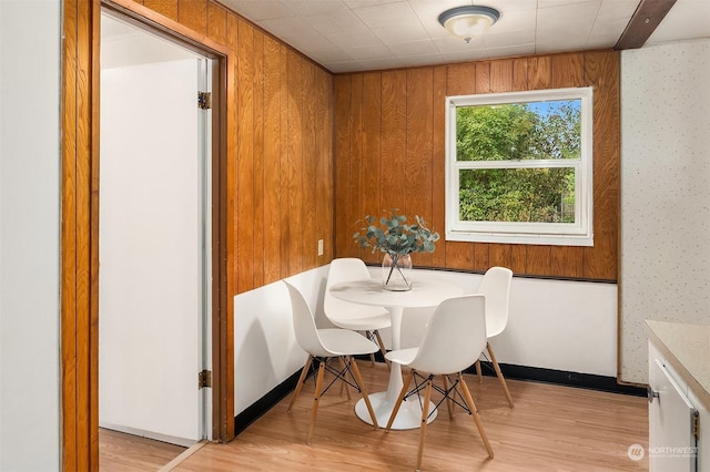 dining room with light hardwood / wood-style flooring