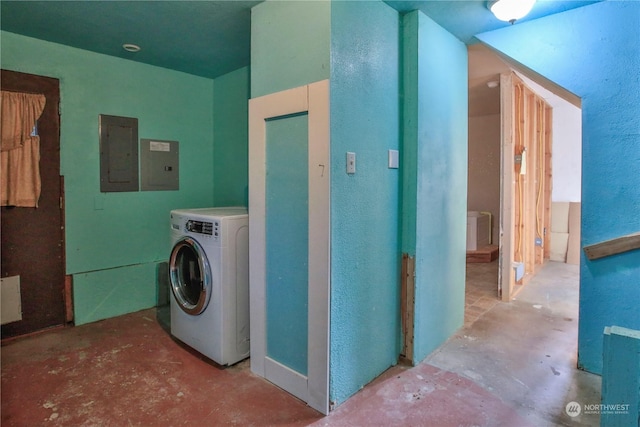 laundry room featuring electric panel and washer / clothes dryer