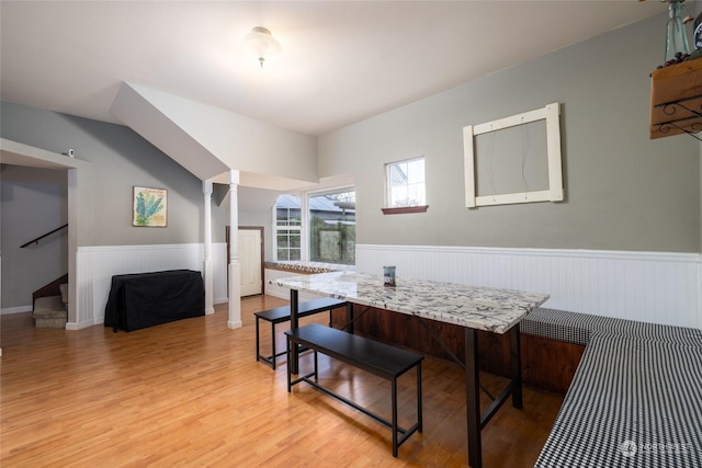 dining space with breakfast area and hardwood / wood-style flooring