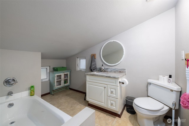 bathroom with a bathing tub, vanity, tile patterned flooring, toilet, and lofted ceiling