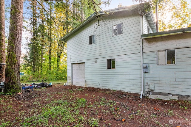 view of home's exterior featuring a garage