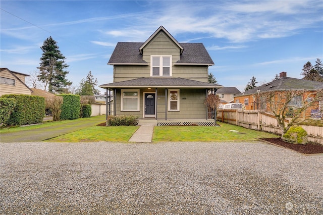 view of front of home with a front lawn and a porch