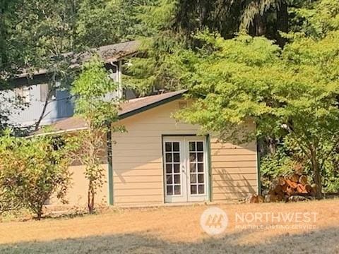 back of property with french doors