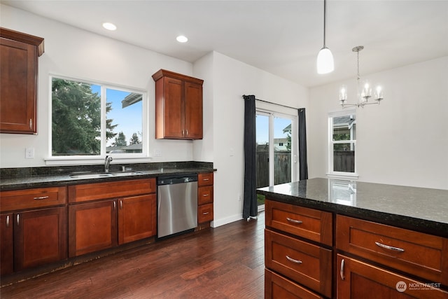 kitchen with stainless steel dishwasher, dark wood-type flooring, sink, decorative light fixtures, and an inviting chandelier