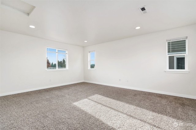 view of carpeted spare room