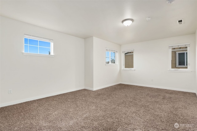 empty room with carpet floors