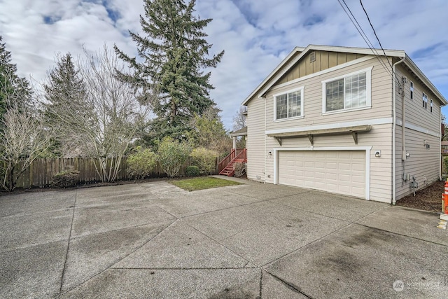 view of property exterior featuring a garage