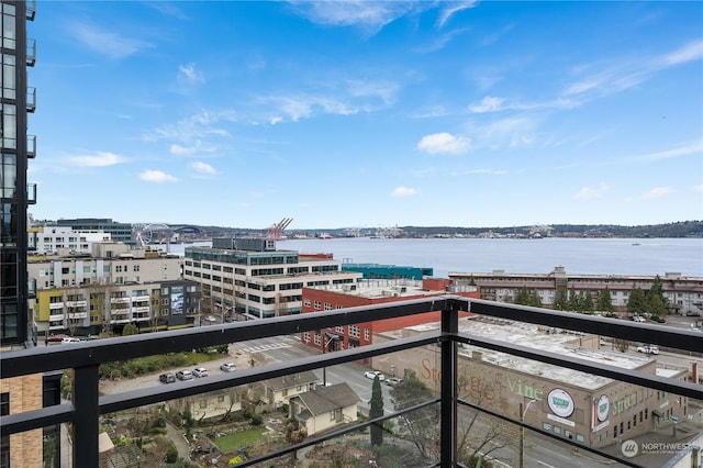 balcony featuring a water view