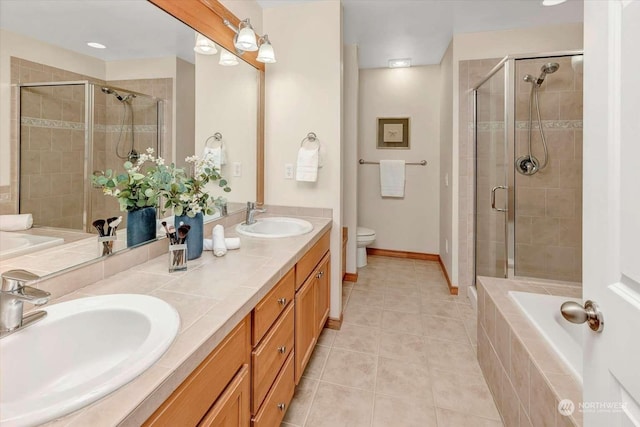 full bathroom with tile patterned flooring, vanity, independent shower and bath, and toilet