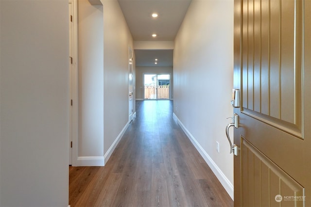 corridor with light wood-type flooring