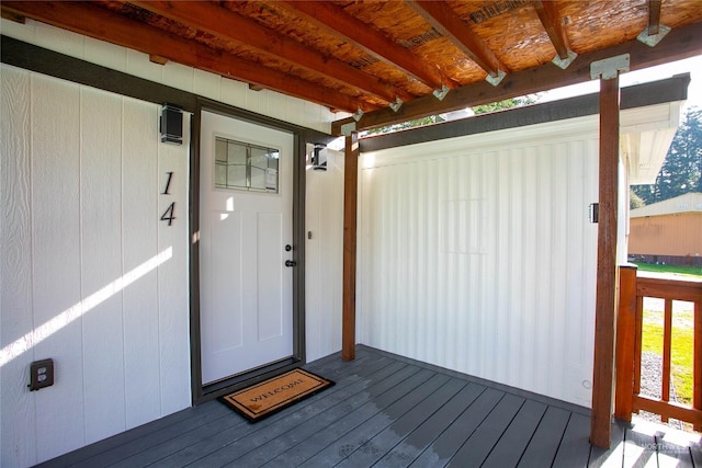 doorway to property with a porch