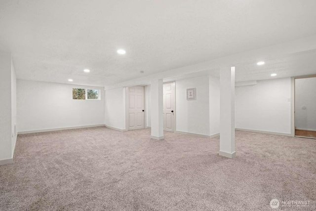 basement with carpet, baseboards, and recessed lighting