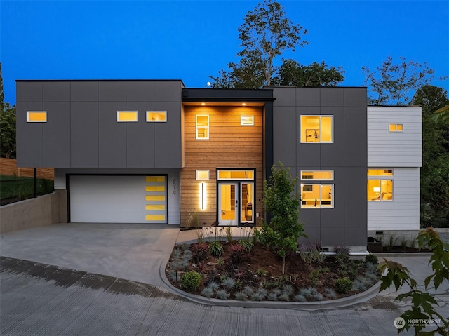 contemporary house featuring a garage