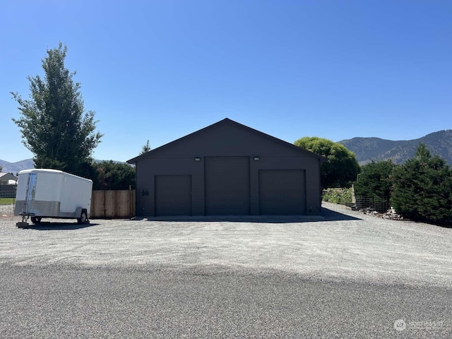 garage featuring a mountain view