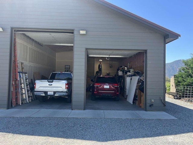 garage featuring a mountain view