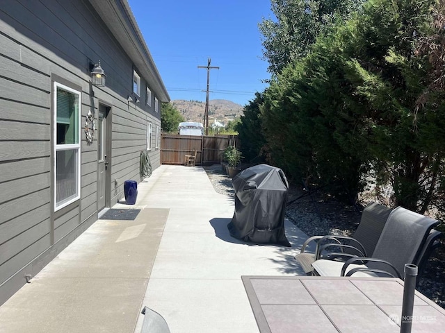 view of patio / terrace with a grill