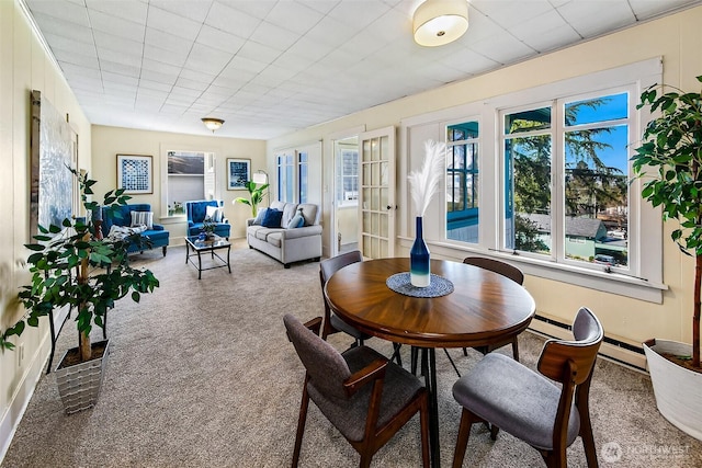 dining room featuring carpet floors