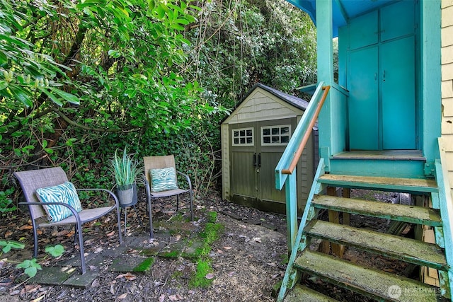 exterior space with an outdoor structure and a shed