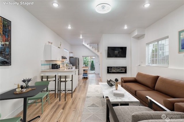 living room featuring light hardwood / wood-style floors