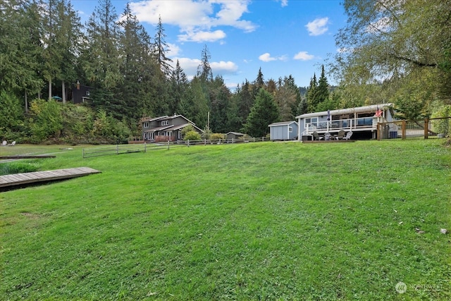 view of yard with a storage shed