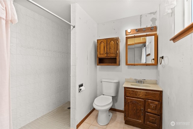 bathroom with tile patterned floors, toilet, a shower, and vanity