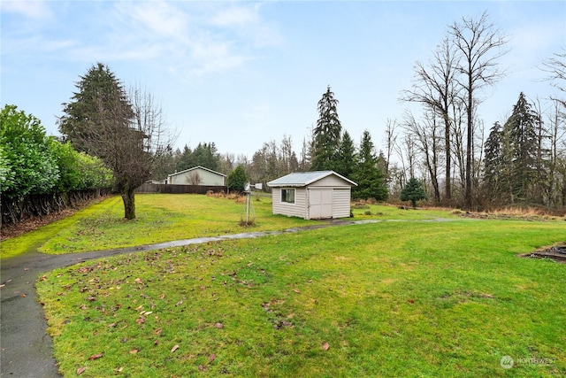 view of yard with a storage shed