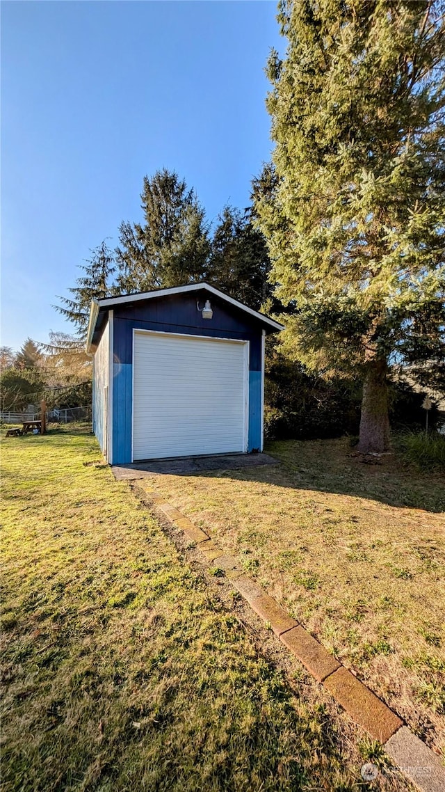 garage with a yard