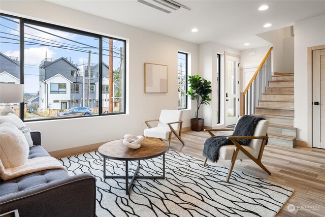 living area featuring light hardwood / wood-style floors