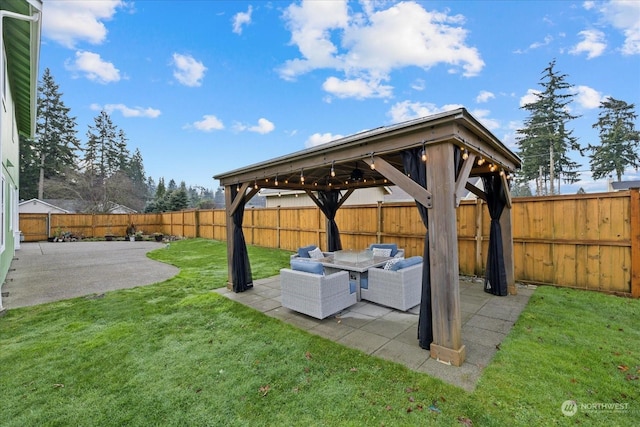 view of yard featuring a gazebo, an outdoor hangout area, and a patio