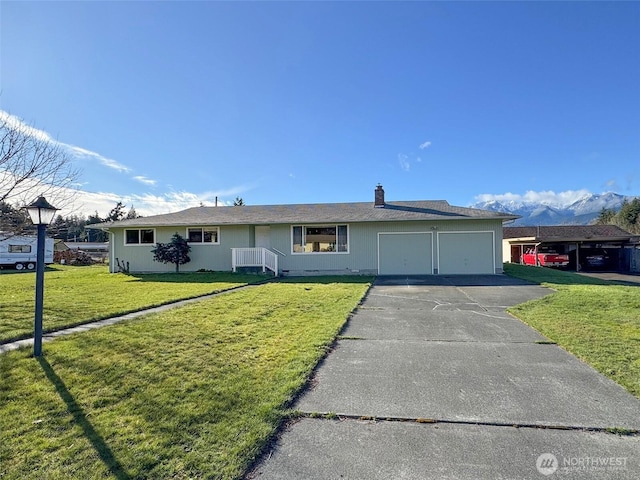 ranch-style house with a front yard, an attached garage, concrete driveway, and a chimney