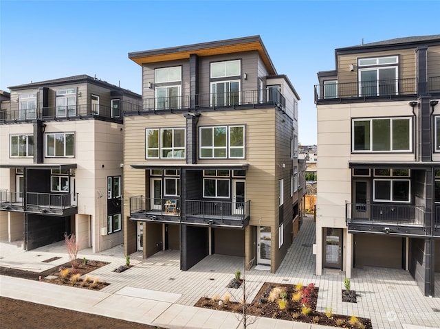 exterior space with decorative driveway