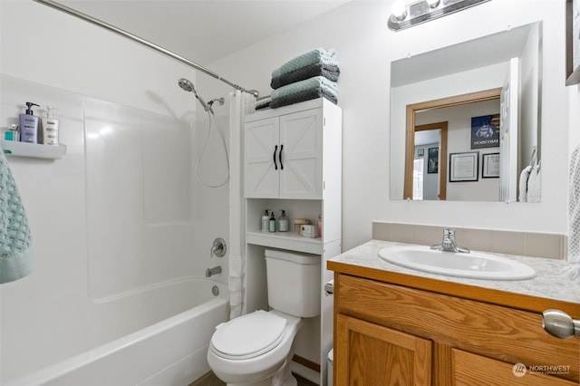 full bathroom featuring vanity, shower / bath combo with shower curtain, and toilet