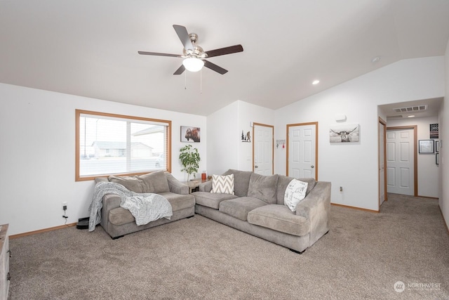 living room featuring ceiling fan, carpet floors, and vaulted ceiling