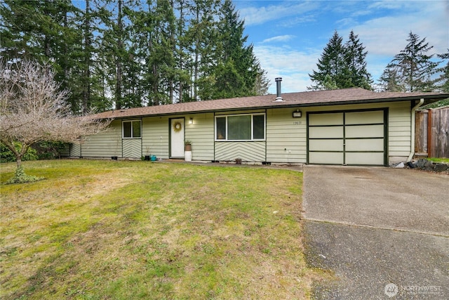 ranch-style house featuring crawl space, aphalt driveway, an attached garage, and a front yard