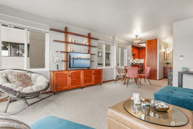 living room with light colored carpet